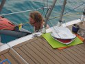 Dishes for seven aboard, doing on the swim step in salt water